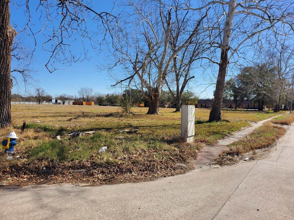 7204 Homestead Road Houston, TX 77028 - Photo 12 of 14 a view of a yard with wooden fence
