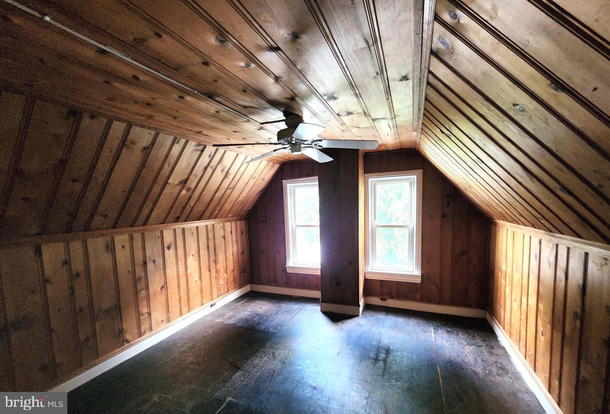 306 Middletown Road Media, PA 19063 - Photo 19 of 22 a view of an empty room with wooden floor and windows