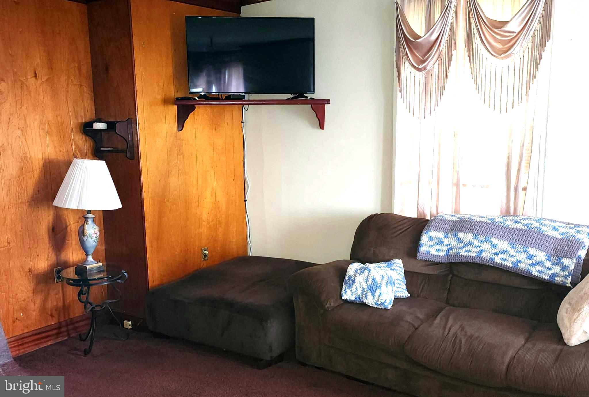 306 Middletown Road Media, PA 19063 - Photo 6 of 22 a living room with furniture and a window