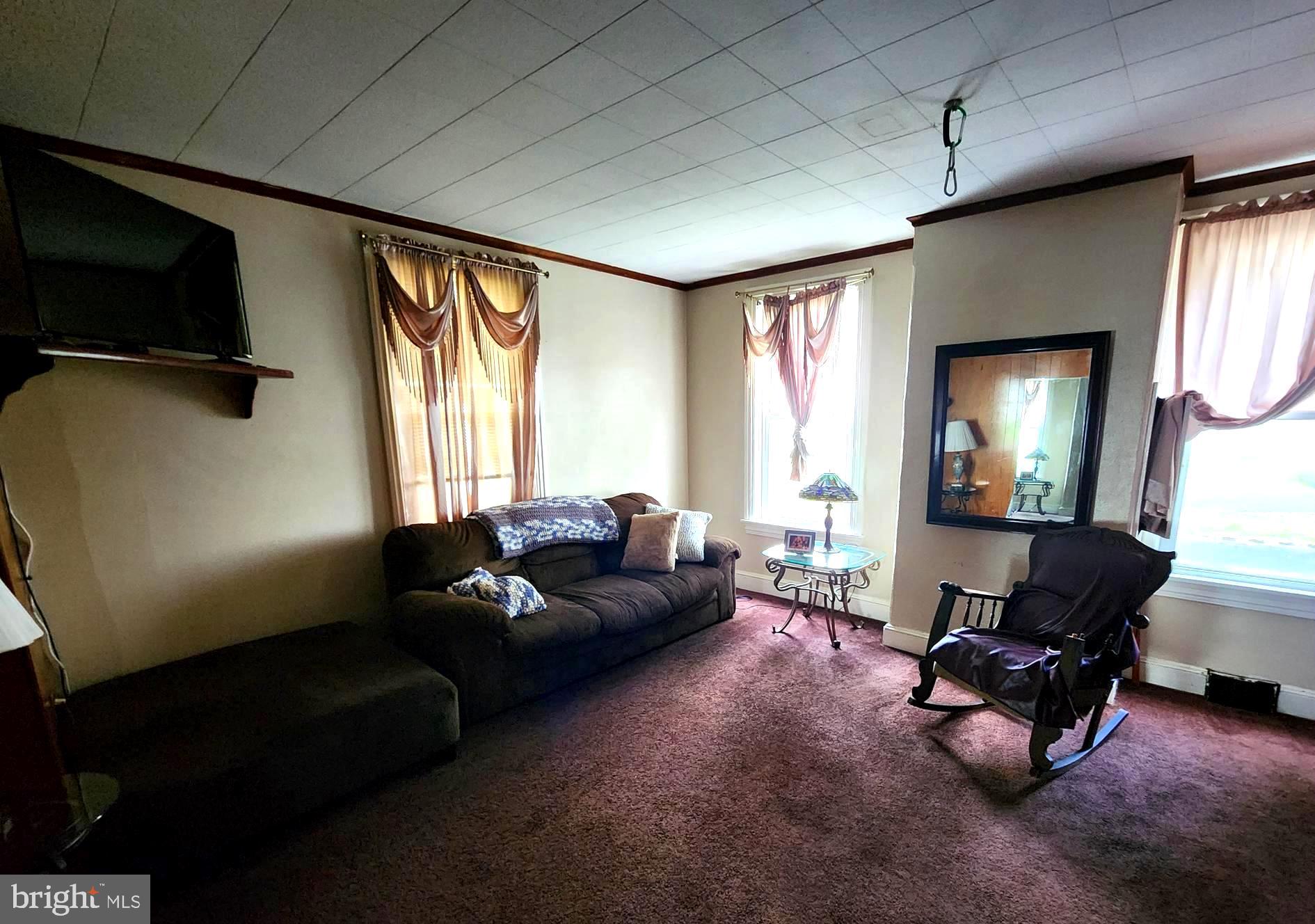 306 Middletown Road Media, PA 19063 - Photo 7 of 22 a living room with furniture and a flat screen tv