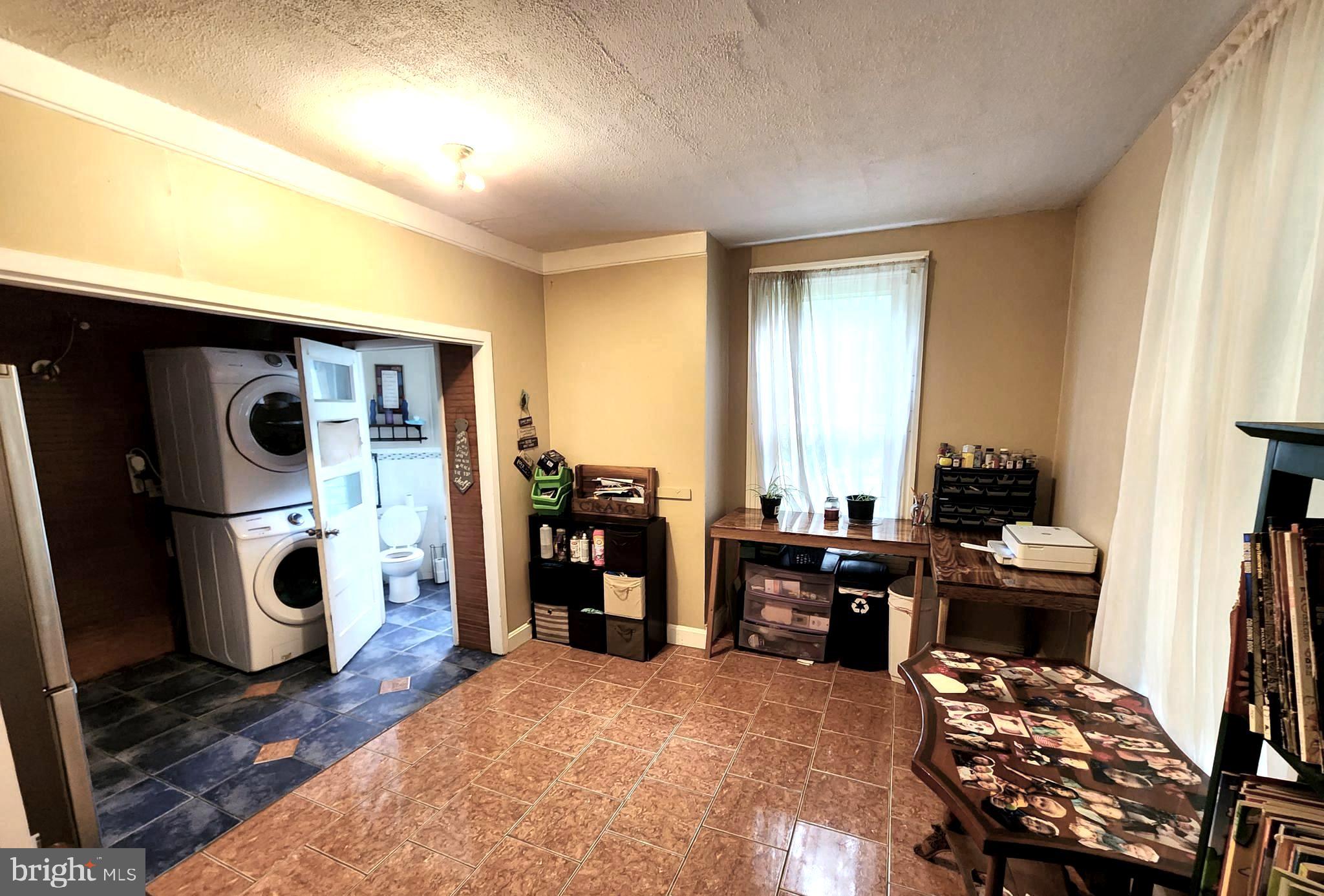 306 Middletown Road Media, PA 19063 - Photo 8 of 22 a view of a livingroom with furniture and a window