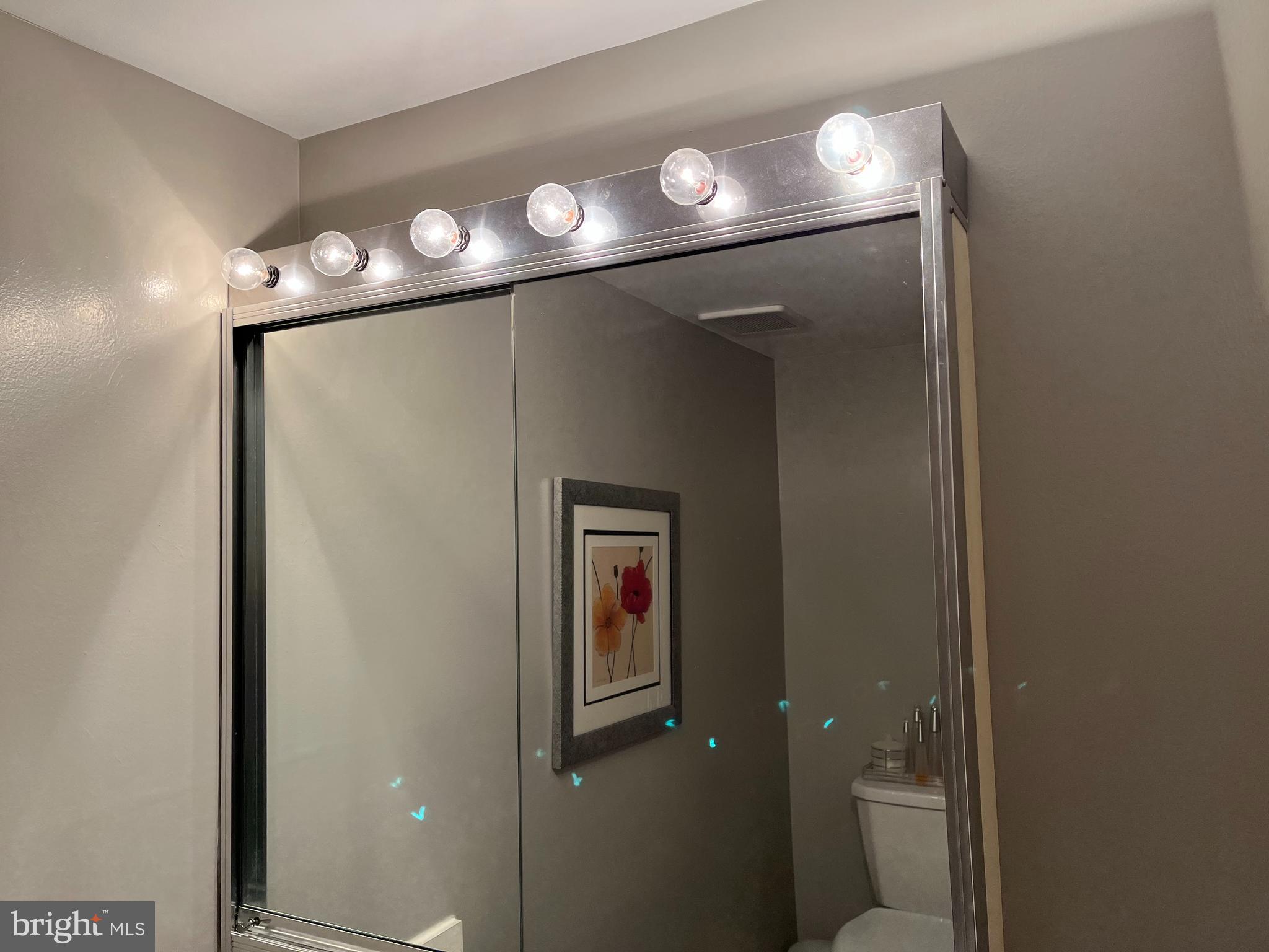2131 Welsh Road, Unit 112 Philadelphia, PA 19115 - Photo 59 of 68 Lighted Mirror