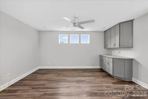 a view of a kitchen with electric appliances