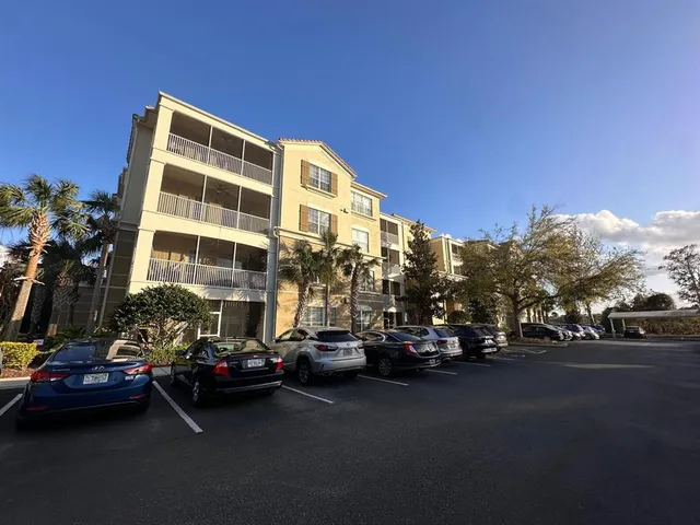 a view of a street with cars