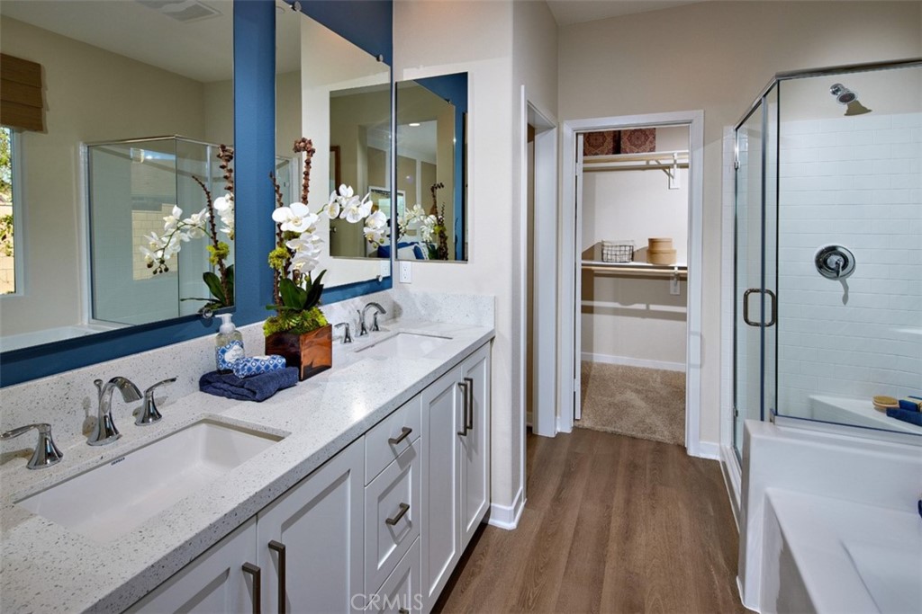 35266 Funk Way Beaumont, CA 92223 - Photo 12 of 19 a bathroom with double vanity sink and mirror