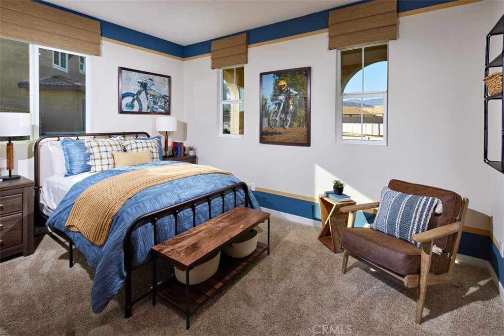 35266 Funk Way Beaumont, CA 92223 - Photo 13 of 19 a bedroom with a bed and a couch