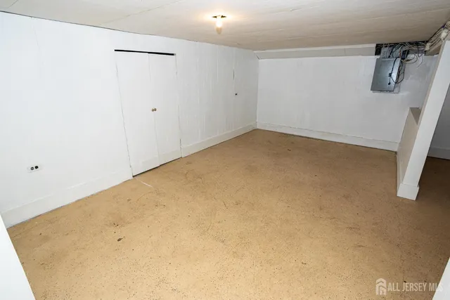 a view of a room with drop ceiling