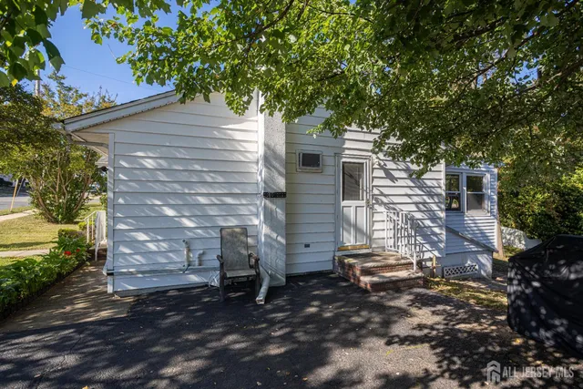 a view of backyard with green space