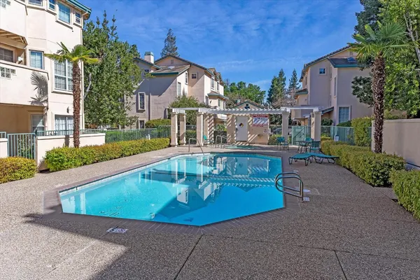 a view of a house with a swimming pool