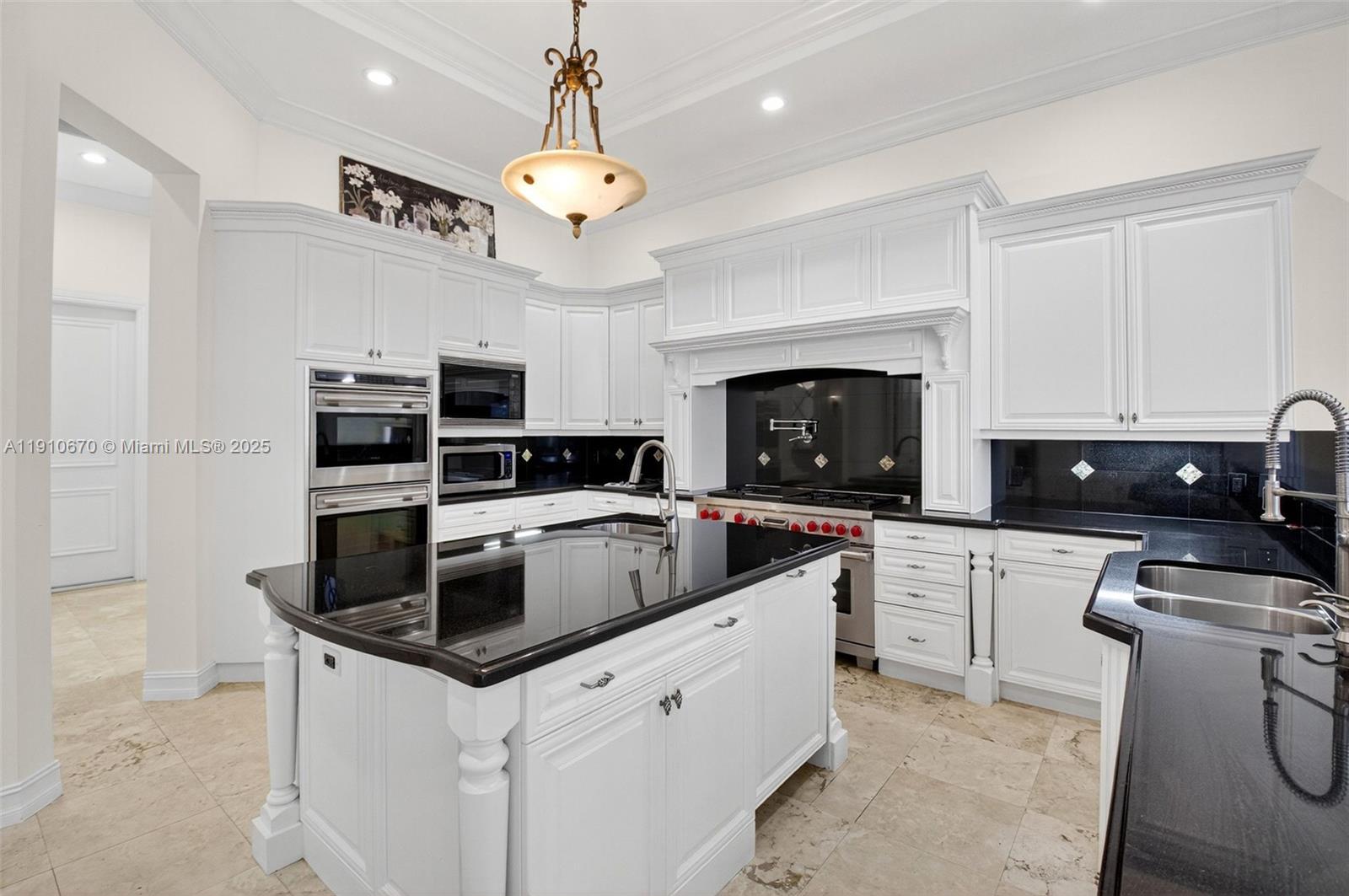 9597 Bridgebrook Drive Boca Raton, FL 33496 - Photo 17 of 88 a kitchen with stainless steel appliances granite countertop a stove and a sink
