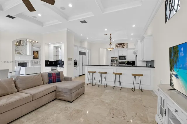 a spacious bathroom with a toilet a sink and mirror