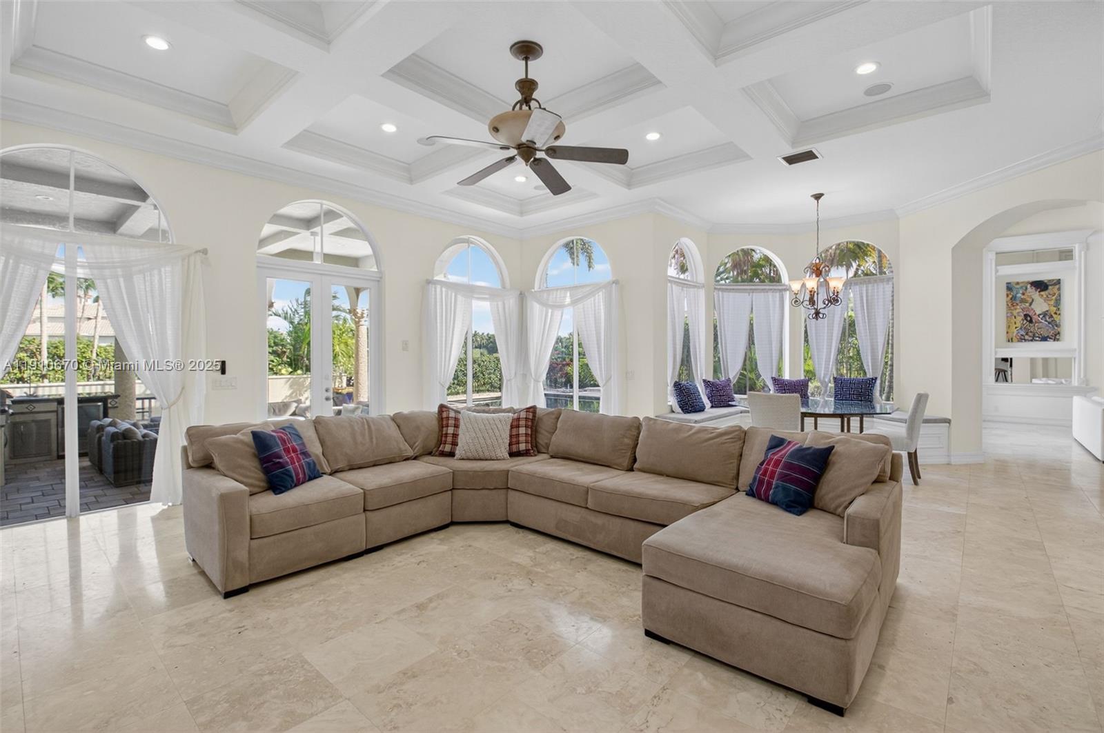 9597 Bridgebrook Drive Boca Raton, FL 33496 - Photo 22 of 88 a living room with furniture and a large window