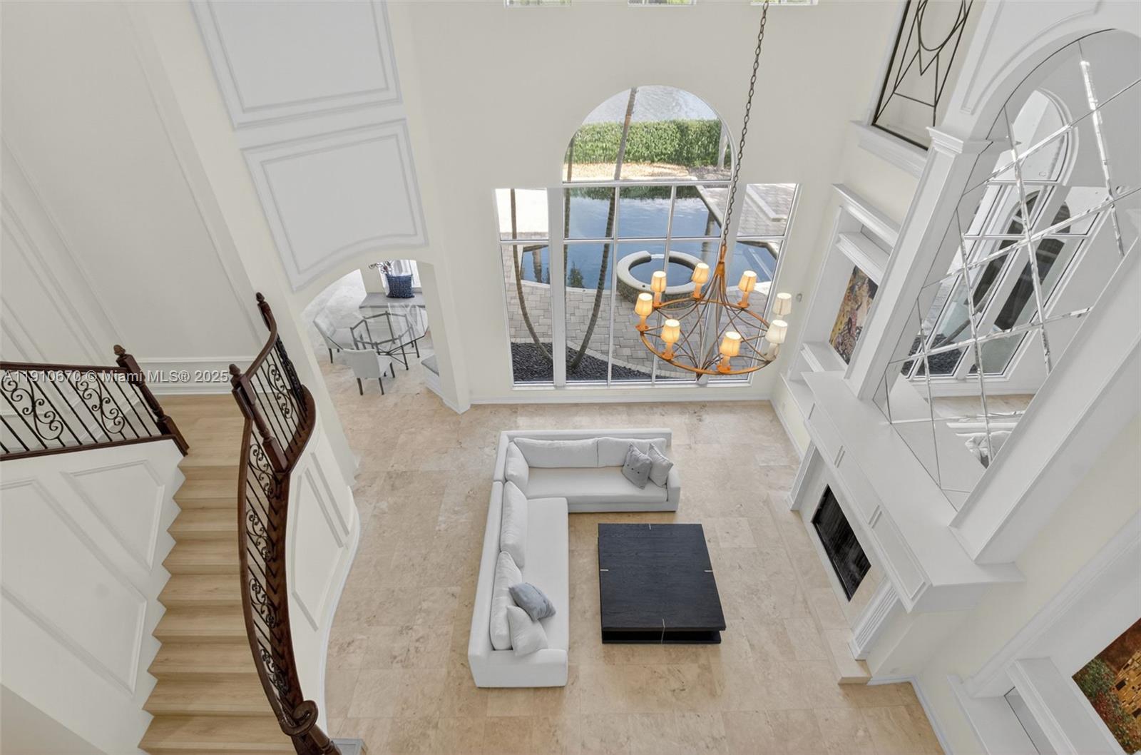 9597 Bridgebrook Drive Boca Raton, FL 33496 - Photo 29 of 88 a view of living room with furniture and a fireplace
