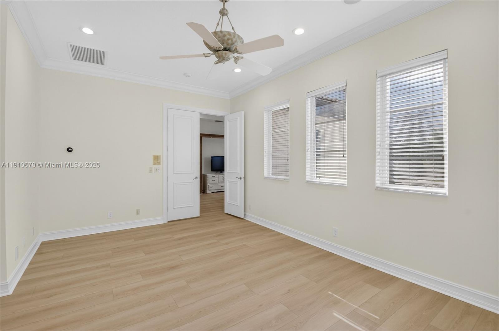 9597 Bridgebrook Drive Boca Raton, FL 33496 - Photo 43 of 88 a view of an empty room with a window