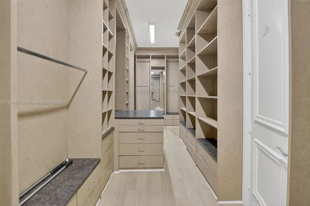 an aerial view of residential house with outdoor space and swimming pool