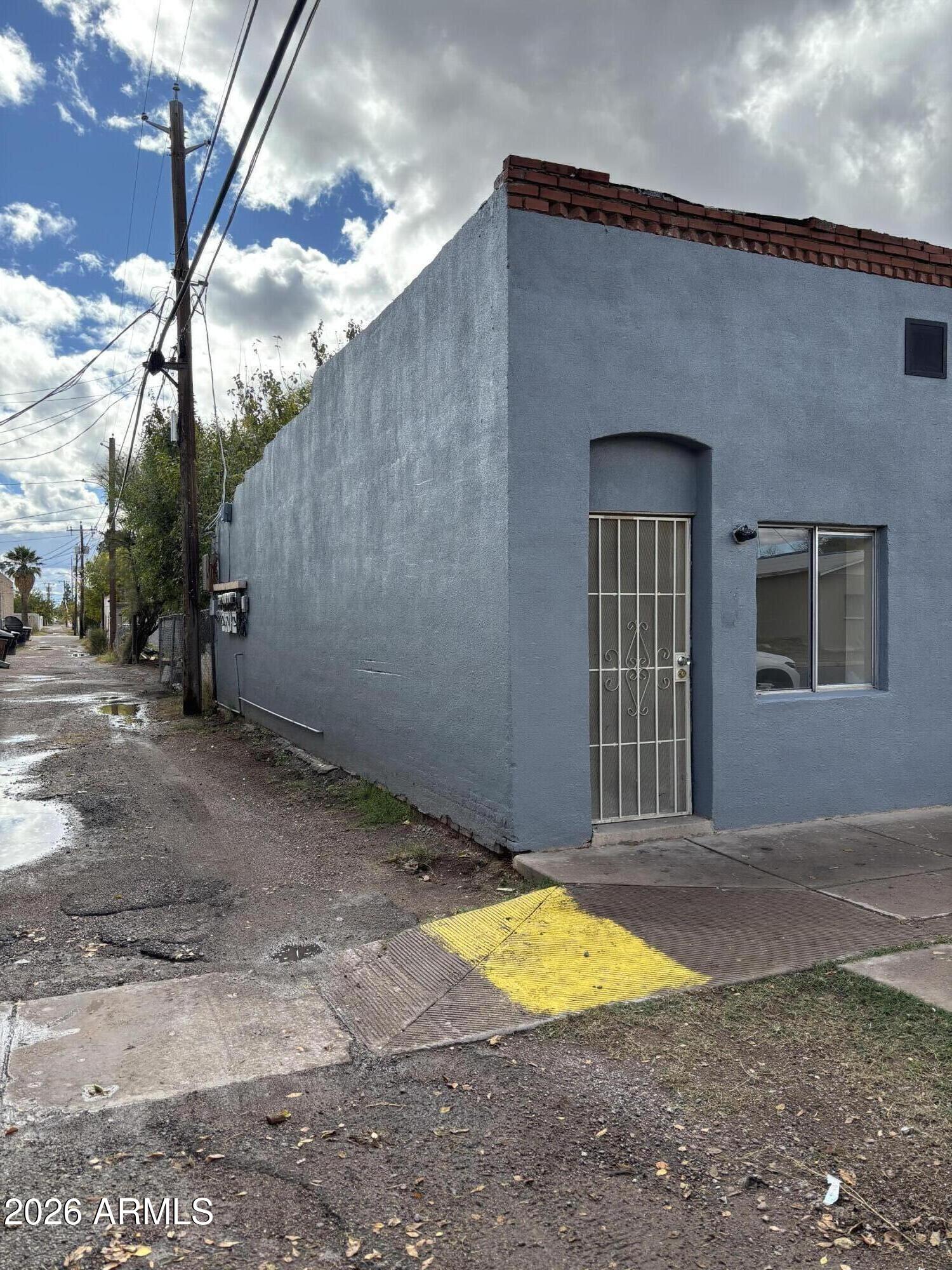 429 East 7th Street Douglas, AZ 85607 - Photo 3 of 3 a front view of a house with a yard