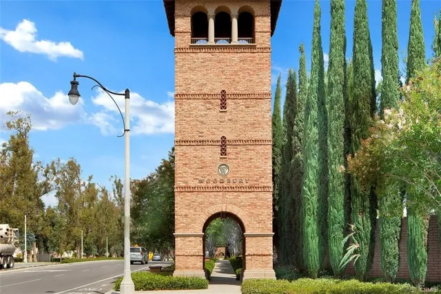 a view of building with a garden