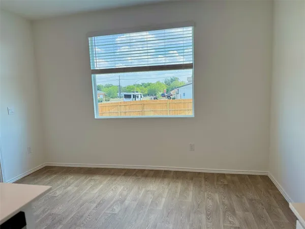 a view of a room that has a window in it