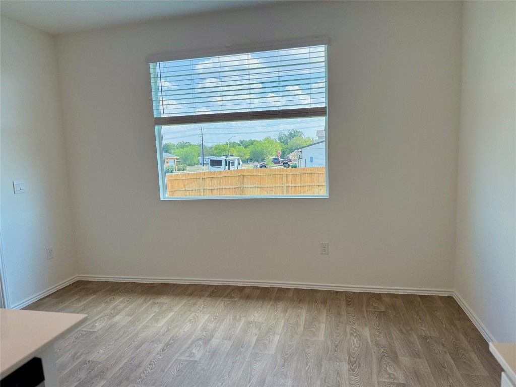 224 Inks Lane Kyle, TX 78640 - Photo 6 of 13 a view of a room that has a window in it