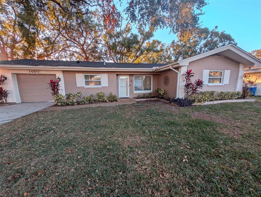 front view of a house with a yard