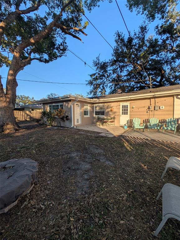 1460 Ruth Road Dunedin, FL 34698 - Photo 17 of 27 a view of a yard with a house
