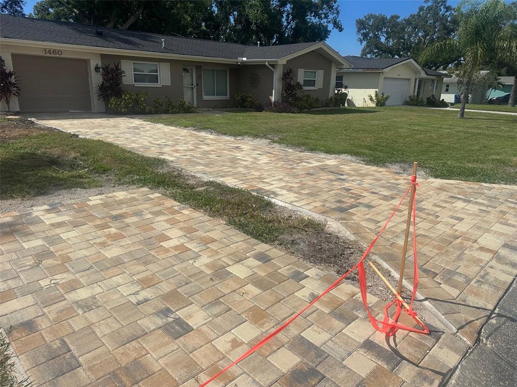 1460 Ruth Road Dunedin, FL 34698 - Photo 27 of 27 a front view of house with yard