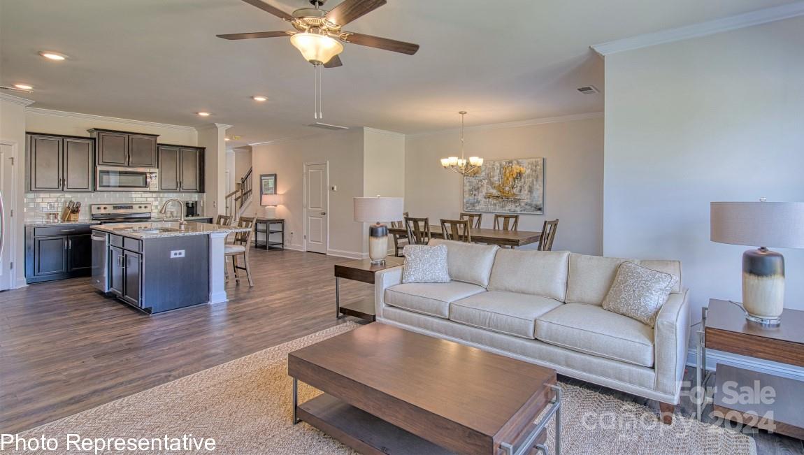 538 Wheatfield Road Fletcher, NC 28732 - Photo 18 of 44 a living room with furniture and kitchen view