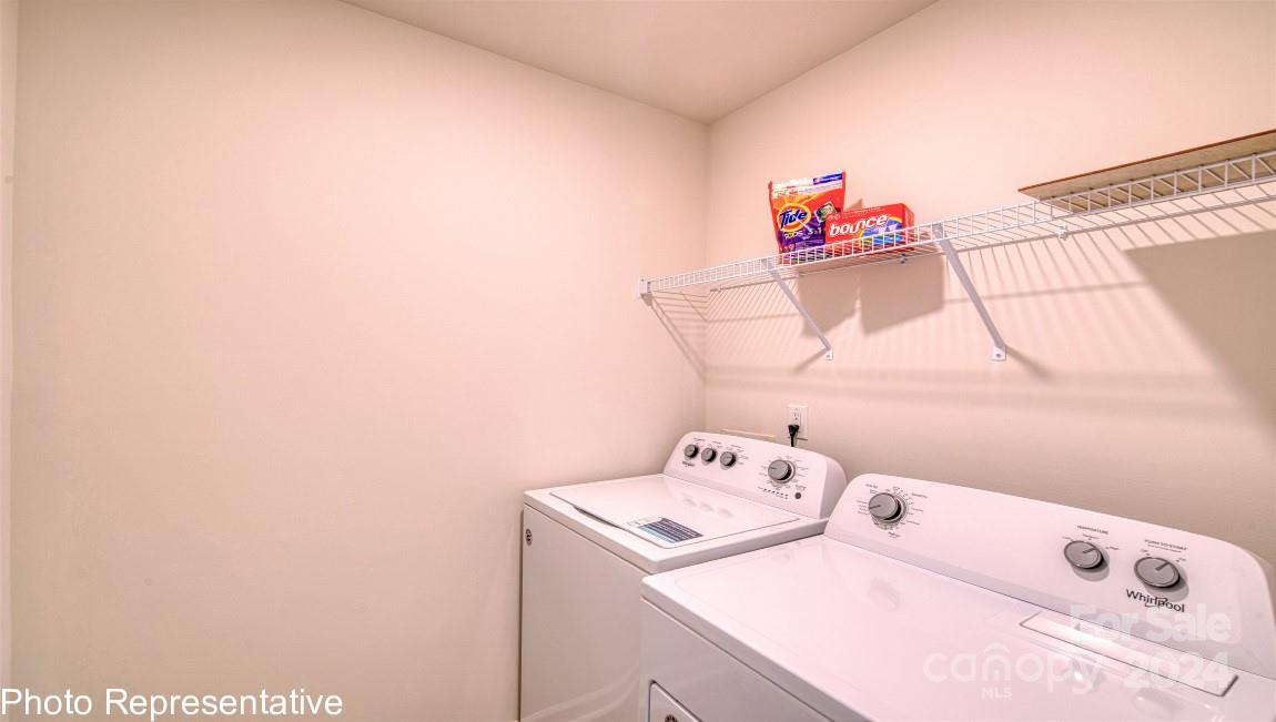 538 Wheatfield Road Fletcher, NC 28732 - Photo 36 of 44 a utility room with dryer and washer