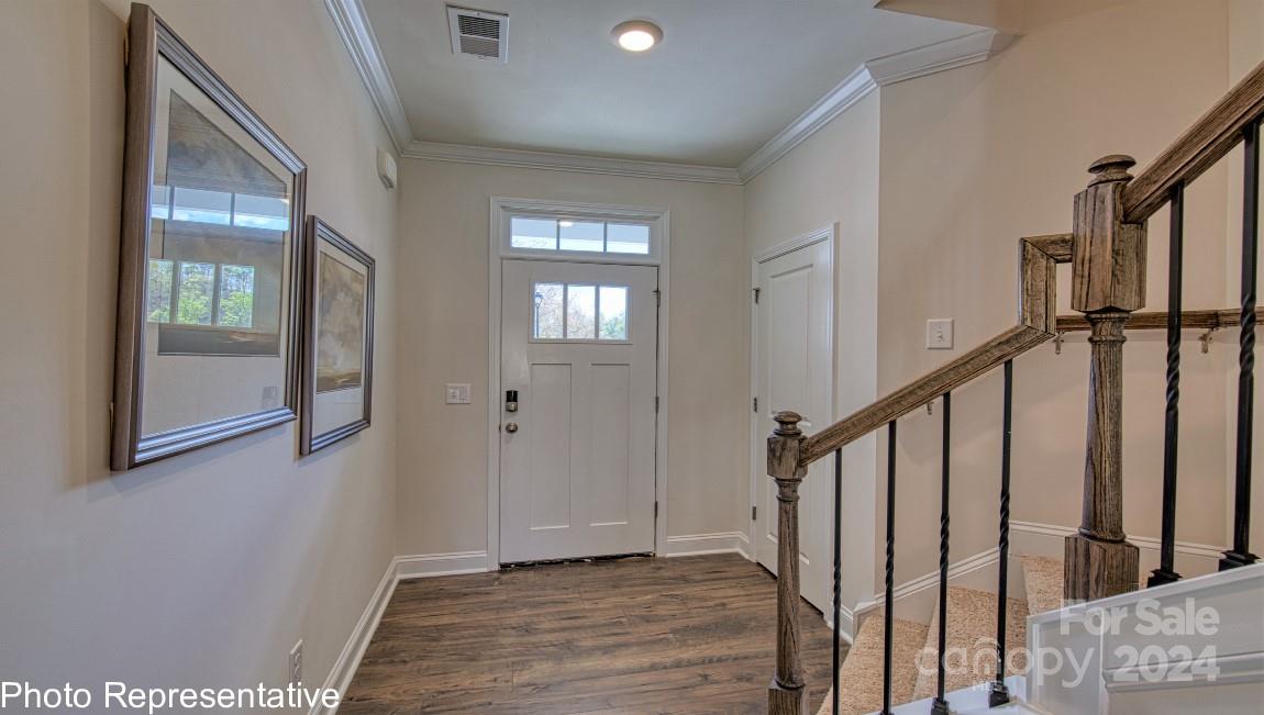 538 Wheatfield Road Fletcher, NC 28732 - Photo 7 of 44 a view of an entryway with wooden floor