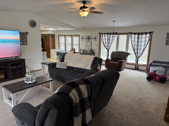 18 Sawmill Road Carbondale, IL 62902 - Photo 7 of 26 a living room with furniture a flat screen tv and a large window