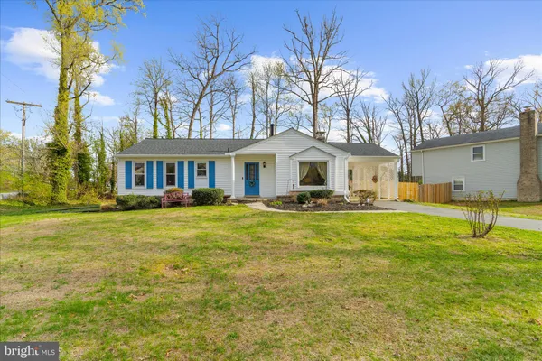 a swimming pool view with a outdoor seating