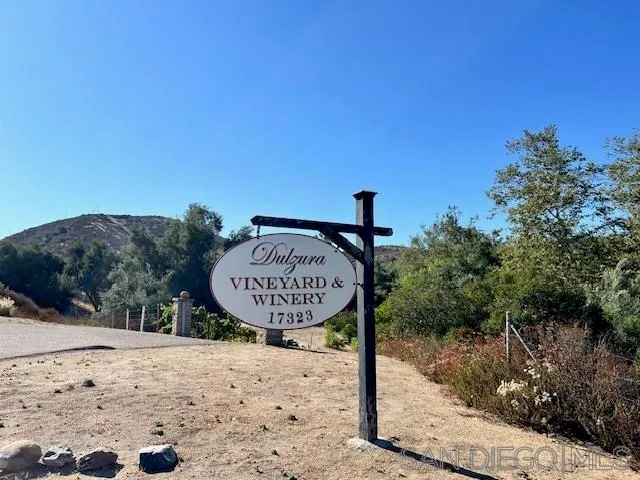 a view of a park with a sign board