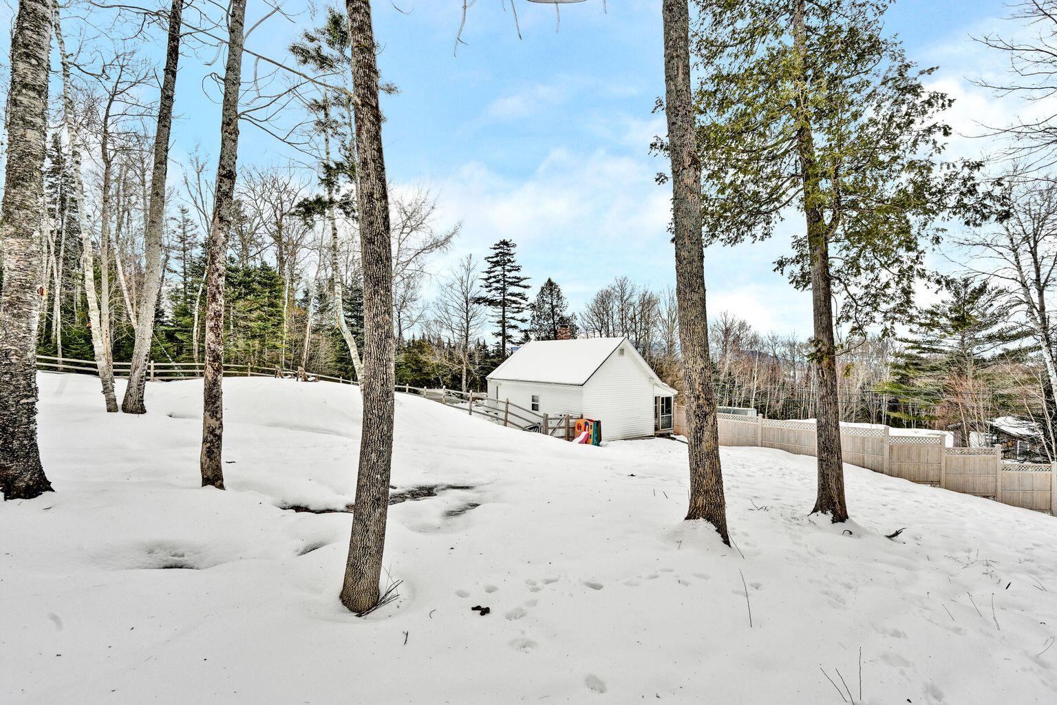 397 Lily Bay Road Greenville, ME 04441 - Photo 11 of 67 397 Lily Bay Road Greenville snow fenced