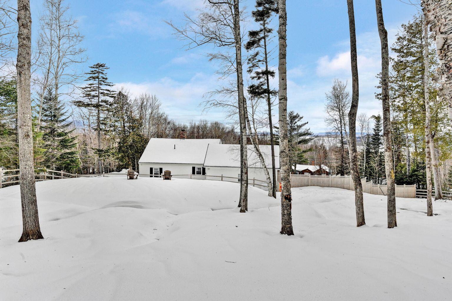 397 Lily Bay Road Greenville, ME 04441 - Photo 10 of 67 397 Lily Bay Road Greenville snow yard