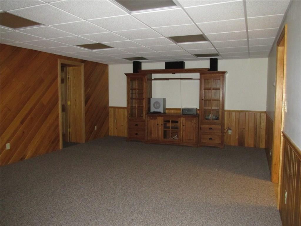 243 Baer Ridge Road Somerset, PA 15501 - Photo 19 of 25 How this room for a movie theater?. Door on the left leads back to the game room. We will continue to the right.