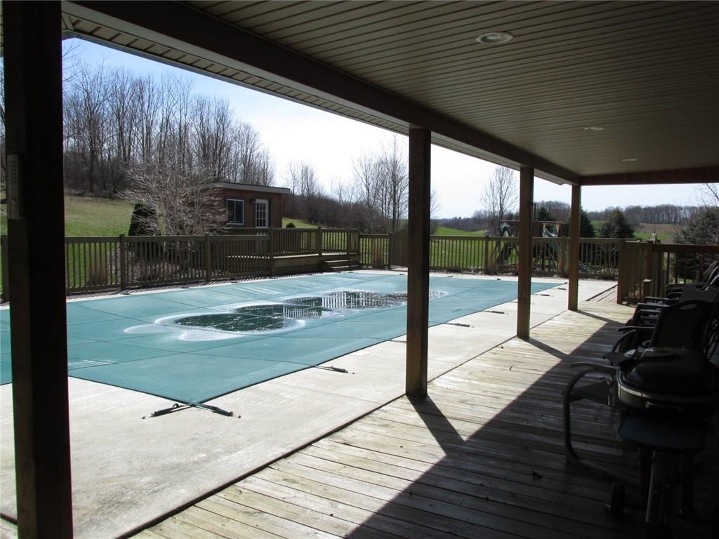 243 Baer Ridge Road Somerset, PA 15501 - Photo 9 of 25 Almost ready for summer! This pool is 20x40 with a deep end diving board. Up to the back left is a pool house with a reinforced deck for a hot tub!