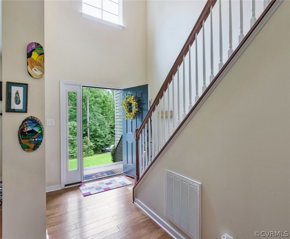 12011 Winterpock Road Chesterfield, VA 23838 - Photo 5 of 33 a view of entryway with stairs and wooden floor