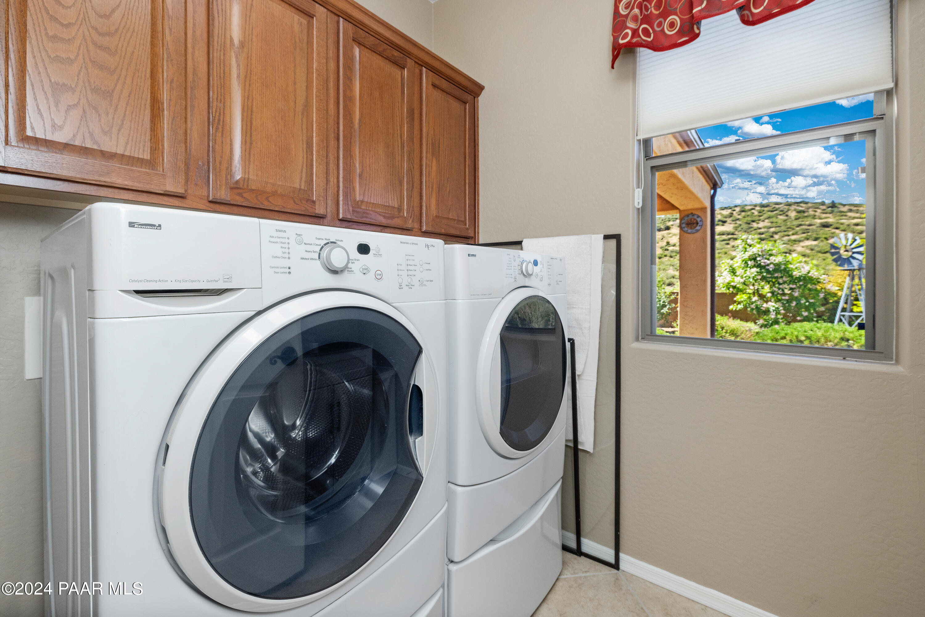 1195 Rigo Ranch Road Prescott Valley, AZ 86314 - Photo 16 of 65 a utility room with dryer and washer