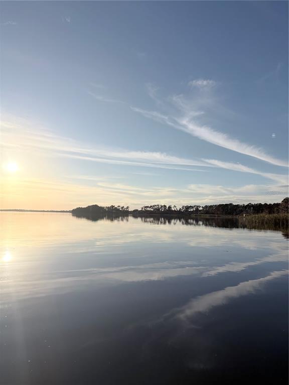 3430 Lake Diane Road Tavares, FL 32778 - Photo 20 of 21 a view of an ocean and beach