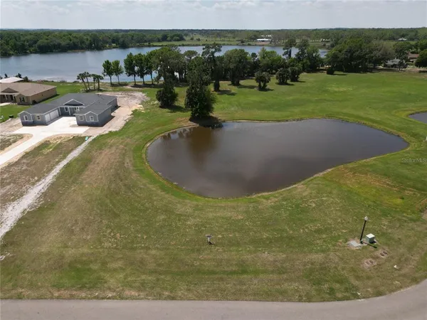 a view of a lake with outdoor space