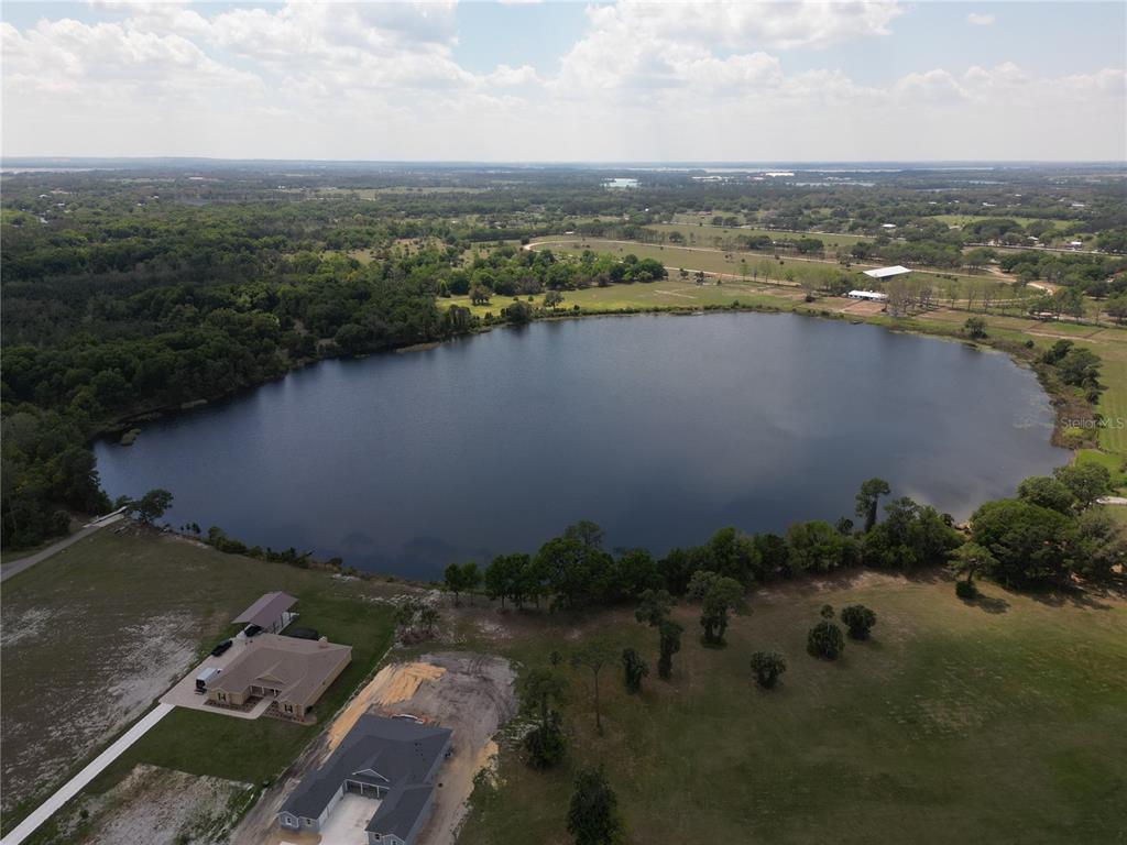 3430 Lake Diane Road Tavares, FL 32778 - Photo 5 of 21 an aerial view of a house with a lake view