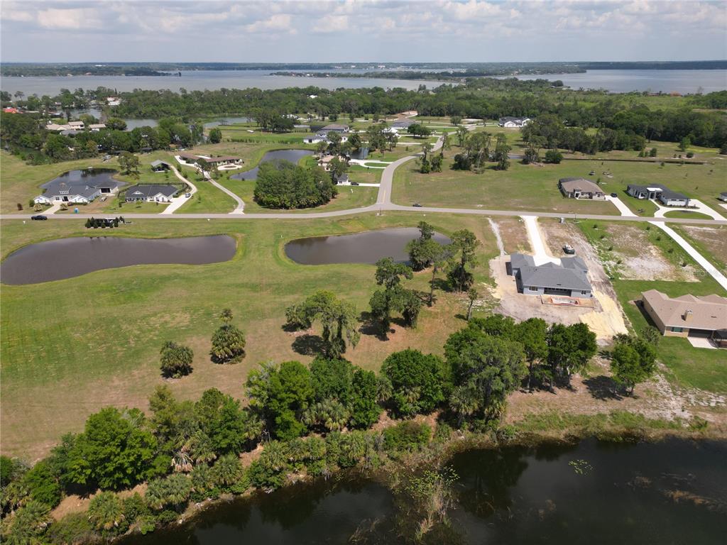 3430 Lake Diane Road Tavares, FL 32778 - Photo 6 of 21 an aerial view of residential houses with outdoor space
