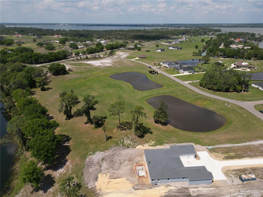 3430 Lake Diane Road Tavares, FL 32778 - Photo 10 of 21 an aerial view of residential houses with outdoor space