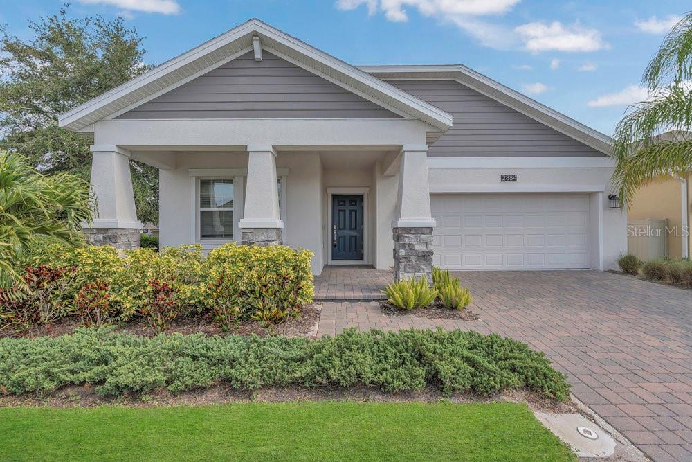 a front view of house with a yard
