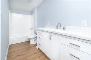 a view of a bathroom with a sink and a toilet