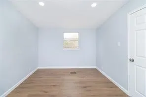 an empty room with a window