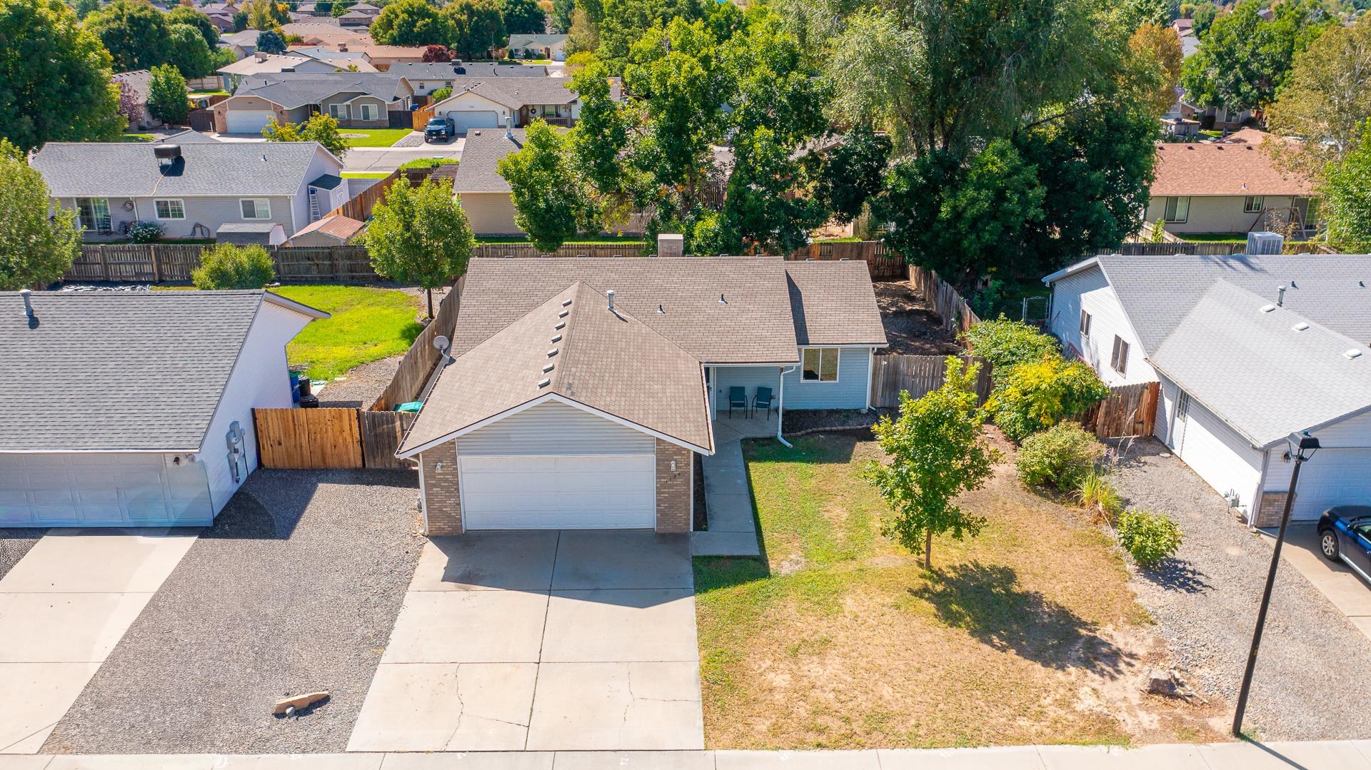 1124 Powell Street Fruita, CO 81521 - Photo 15 of 16 an aerial view of a house with a swimming pool