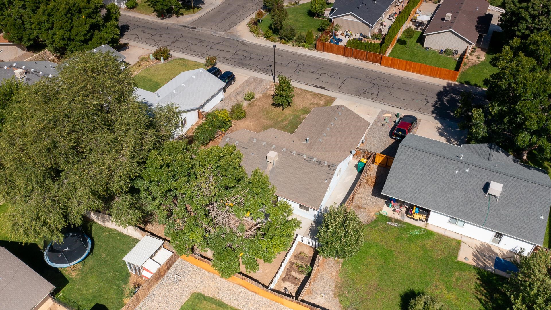 1124 Powell Street Fruita, CO 81521 - Photo 16 of 16 an aerial view of residential house with outdoor space and parking