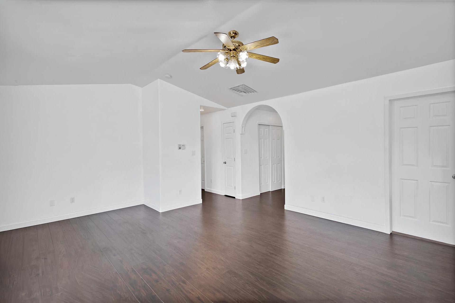 1124 Powell Street Fruita, CO 81521 - Photo 3 of 16 a view of an empty room with a window
