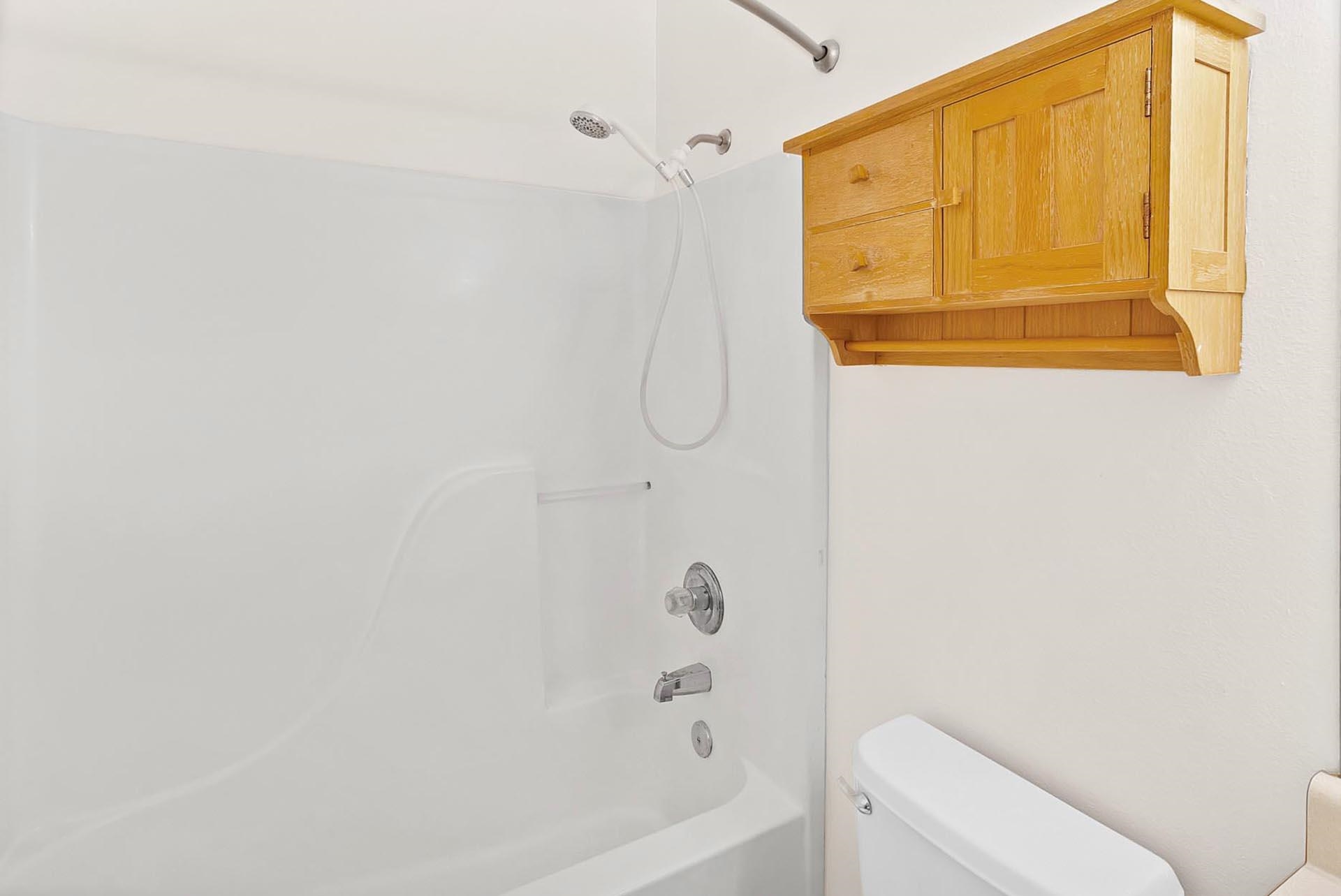 1124 Powell Street Fruita, CO 81521 - Photo 9 of 16 a bathroom with a shower and a toilet